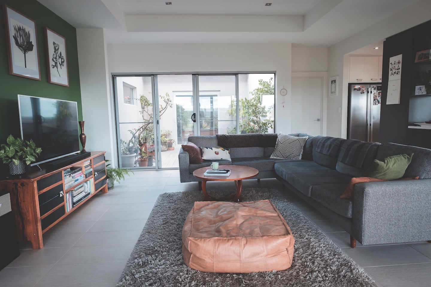 Living room with pictures above the TV