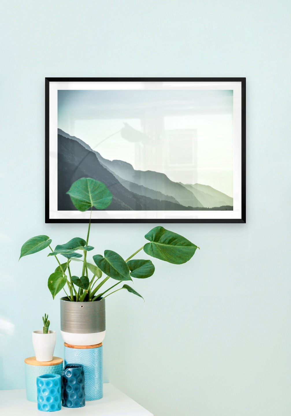 Gallery wall with picture frame in black in size 50x70 with print "Foggy mountain"