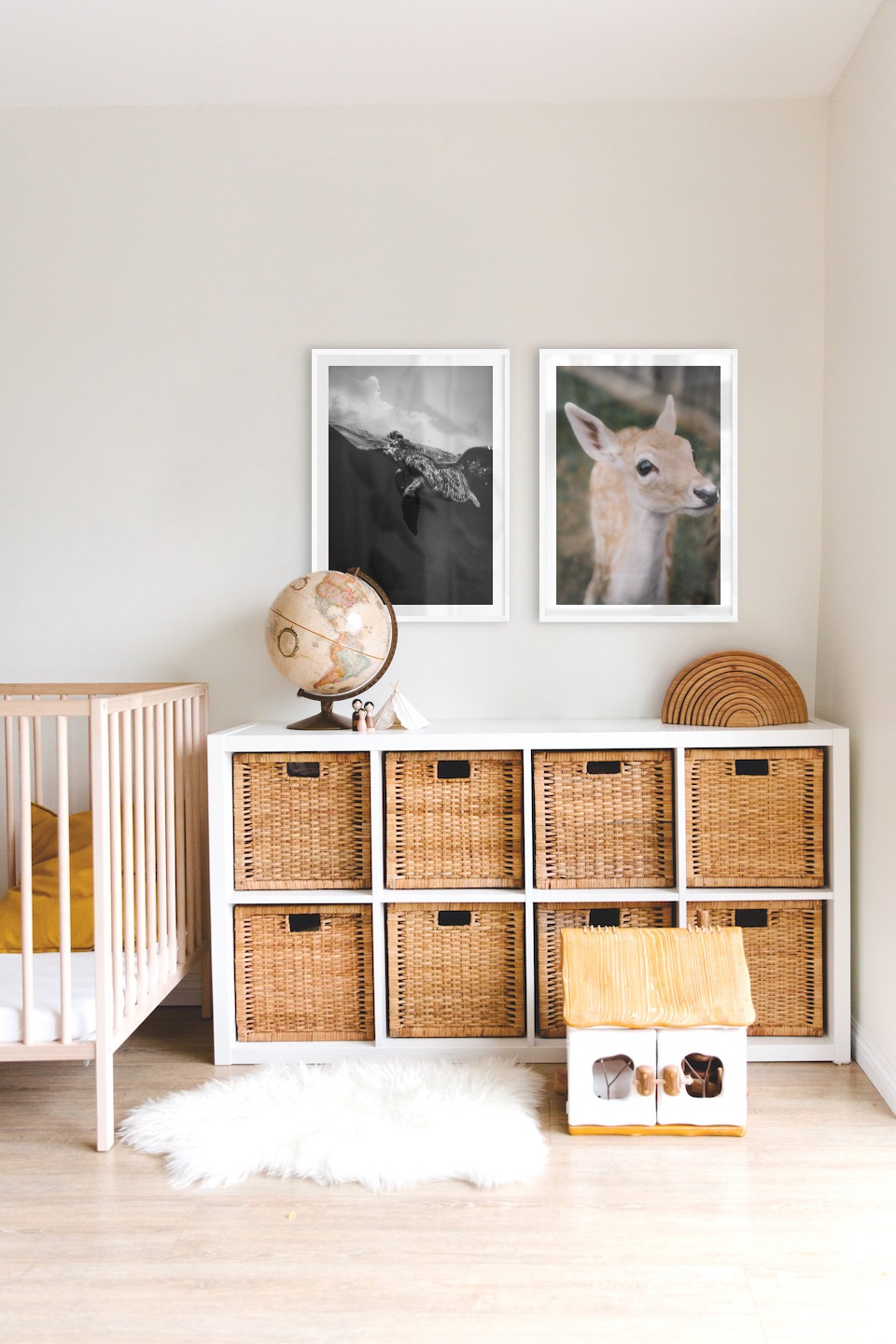 Gallery wall with picture frames in white in sizes 50x70 with prints "Turtle" and "Deer"