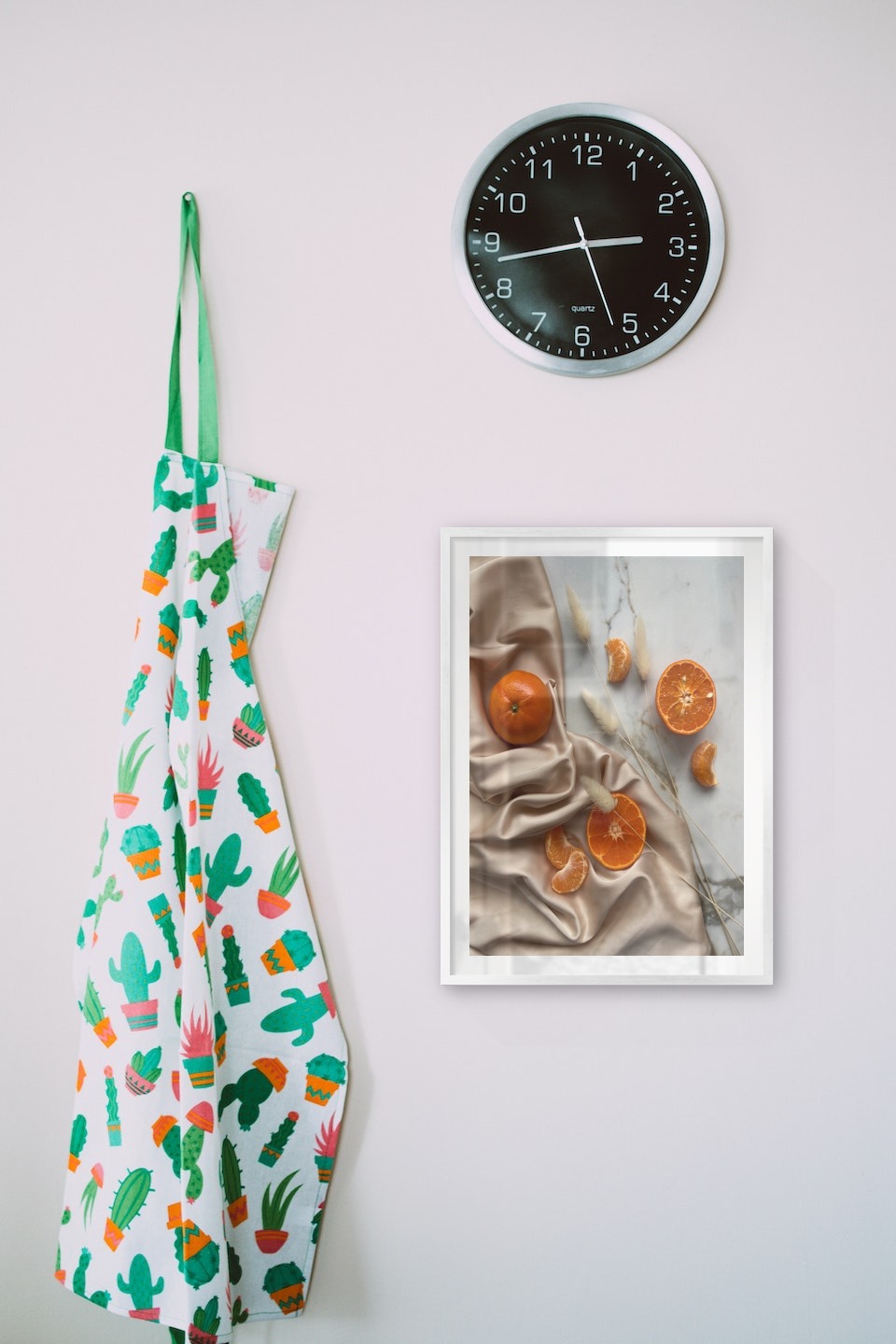 Gallery wall with picture frame in silver in size 50x70 with print "Oranges"