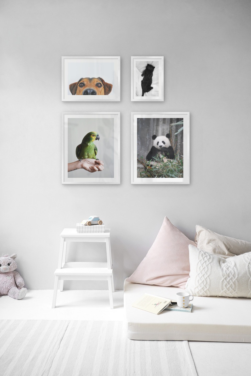 Gallery wall with picture frames in silver in sizes 40x50, 30x40 and 21x30 with prints "Green parrot", "Panda", "Hundnos" and "Cat in bed"