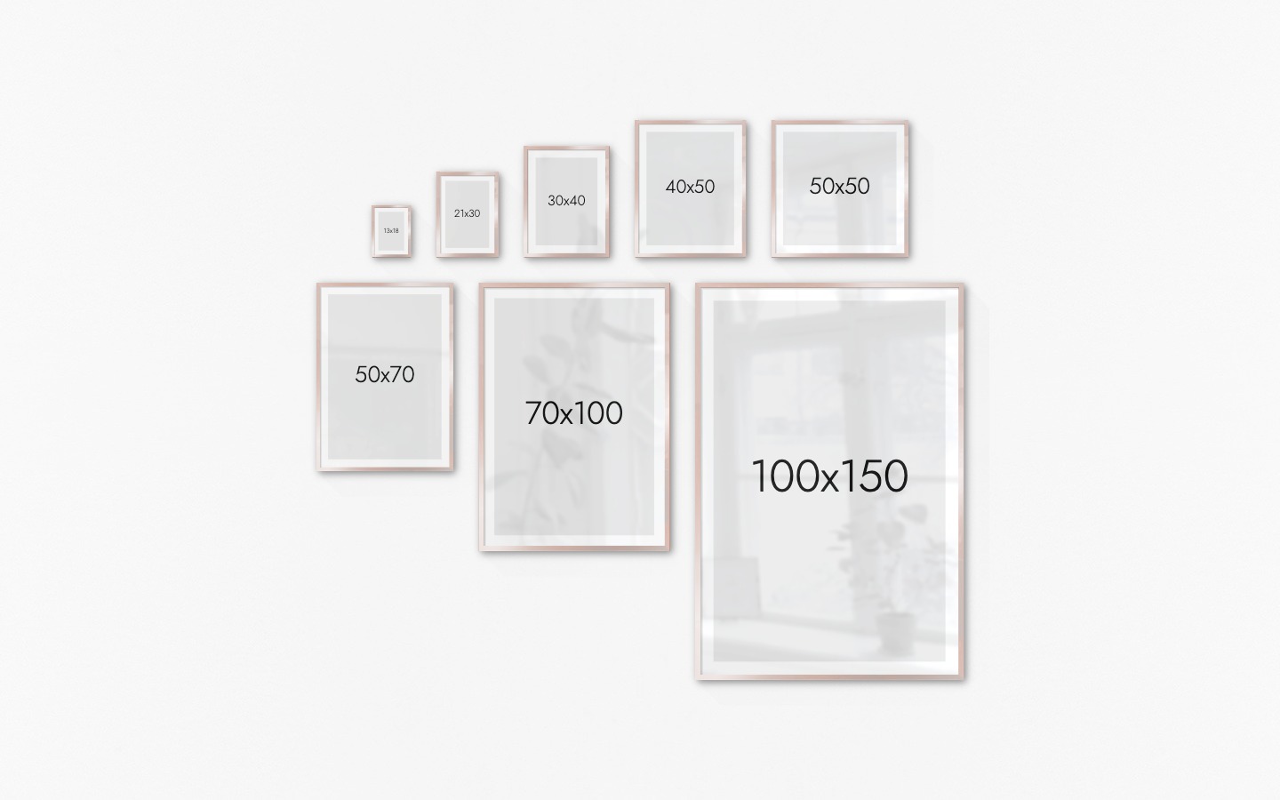 Gallery wall with picture frames in copper in sizes 13x18, 21x30, 30x40, 40x50, 50x50, 50x70, 70x100 and 100x150