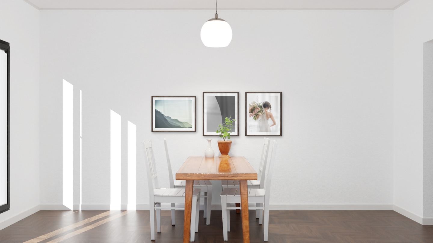 Gallery wall with picture frames in dark wood in sizes 40x50 with prints "Foggy mountain", "Line" and "Bride and flowers"