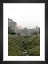 Gallery wall with picture frame in black in size 13x18 with print "Green valley in front of mountains"