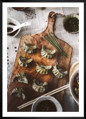 Gallery wall with picture frame in black in size 50x70 with print "Dumplings"