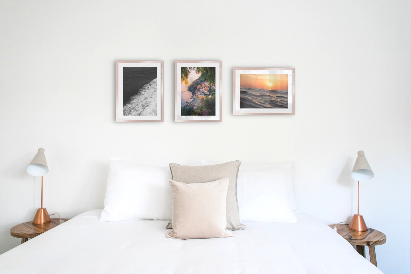 Gallery wall with picture frames in copper in sizes 30x40 with prints "Swell from waves", "City by the sea" and "Waves and the sun"