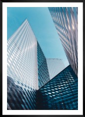 Gallery wall with picture frame in black in size 50x70 with print "Facade of building"