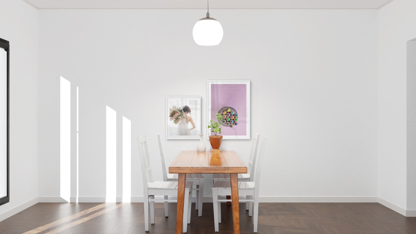 Gallery wall with picture frames in white in sizes 40x50 and 50x70 with prints "Bride and flowers" and "Canned pens"