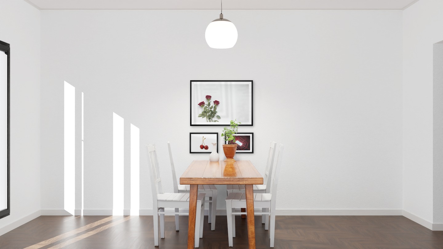 Gallery wall with picture frames in black in sizes 50x70 and 21x30 with prints "Red roses", "Cherries with white background" and "Airplane above building"