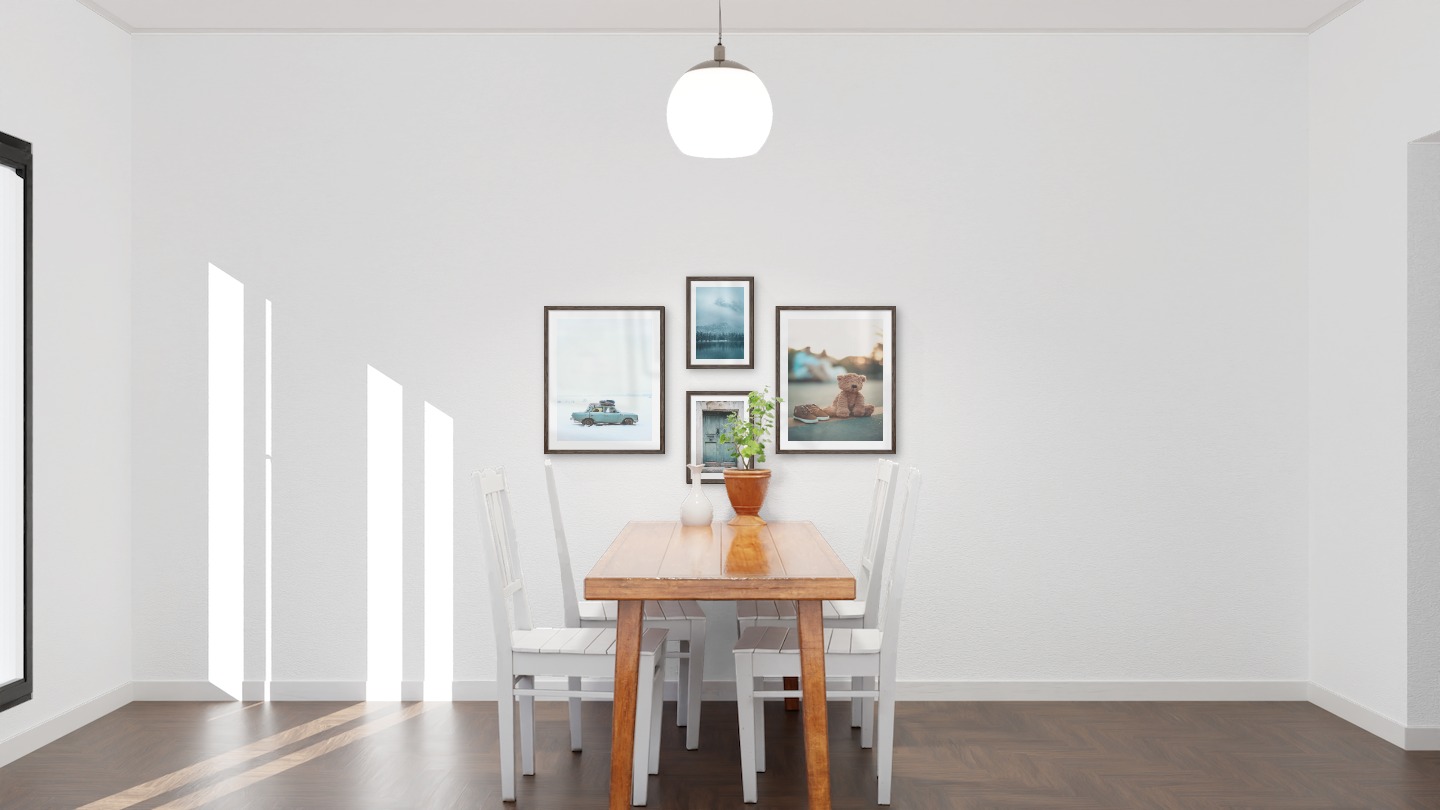 Gallery wall with picture frames in dark wood in sizes 40x50 and 21x30 with prints "Car in snow", "Door", "Lake, mountains and forest" and "Teddy bear on the street"