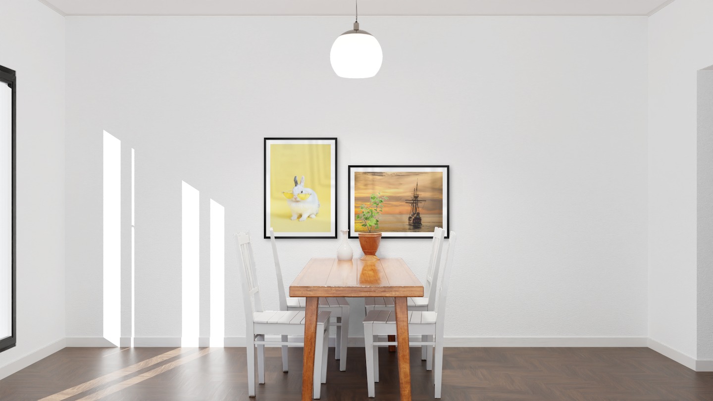 Gallery wall with picture frames in black in sizes 50x70 with prints "Rabbit with glasses" and "Ships at sea"