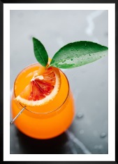 Gallery wall with picture frame in black in size 50x70 with print "Orange drink"