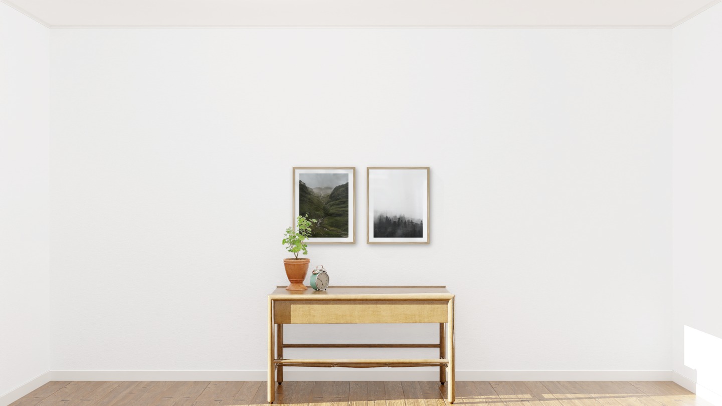 Gallery wall with picture frames in wood in sizes 40x50 with prints "Stream in valley" and "Foggy wooden tops"