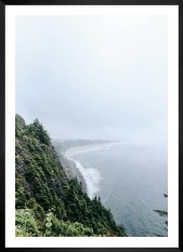 Gallery wall with picture frame in black in size 50x70 with print "Rocks facing the water"