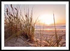 Gallery wall with picture frame in black in size 50x70 with print "Straw on the beach"