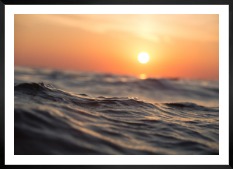 Gallery wall with picture frame in black in size 50x70 with print "Waves and the sun"