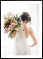 Gallery wall with picture frame in black in size 50x70 with print "Bride and flowers"
