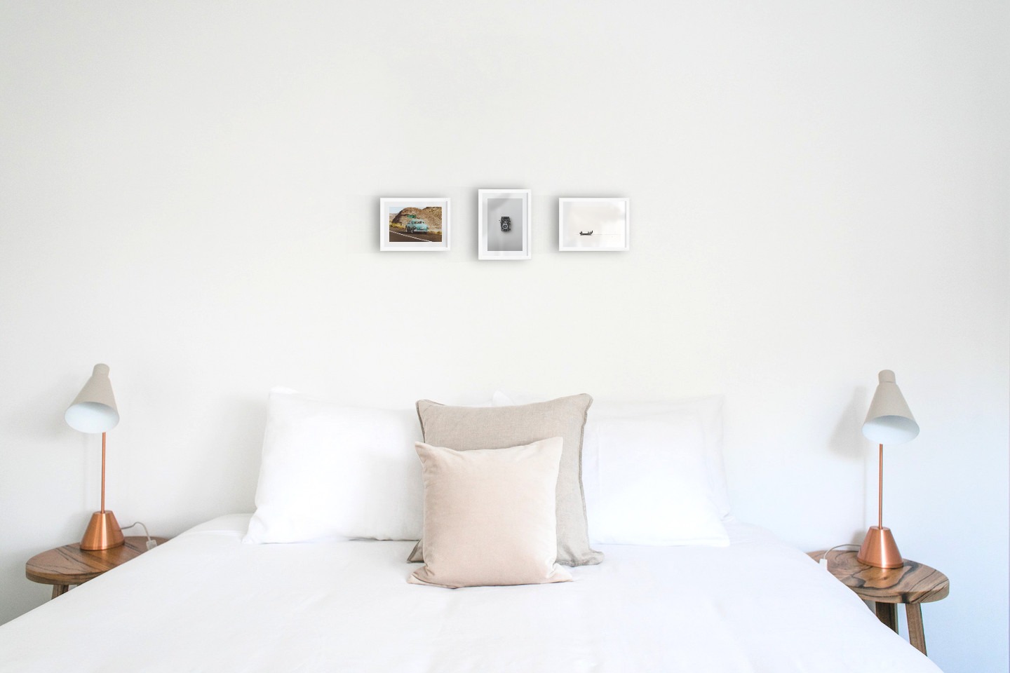 Gallery wall with picture frames in white in sizes 13x18 with prints "Car on the road", "Camera" and "People in boat"