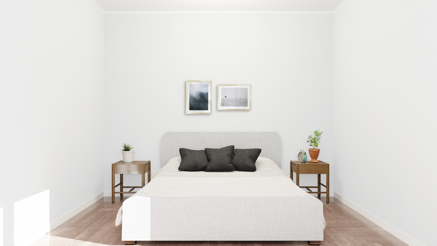 Gallery wall with picture frames in gold in sizes 30x40 with prints "Foggy forest" and "Birds over the sea"