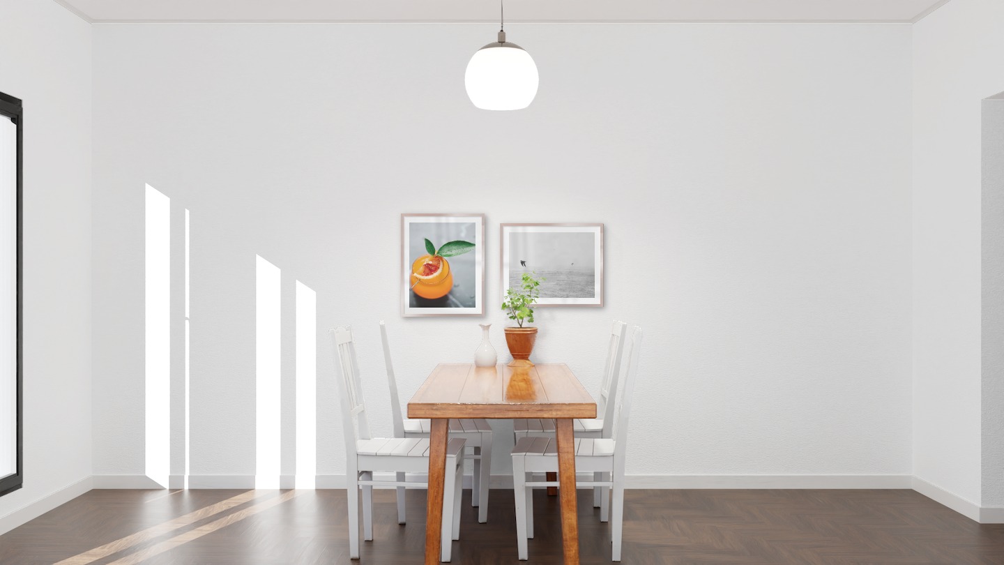 Gallery wall with picture frames in copper in sizes 40x50 with prints "Orange drink" and "Birds over the sea"