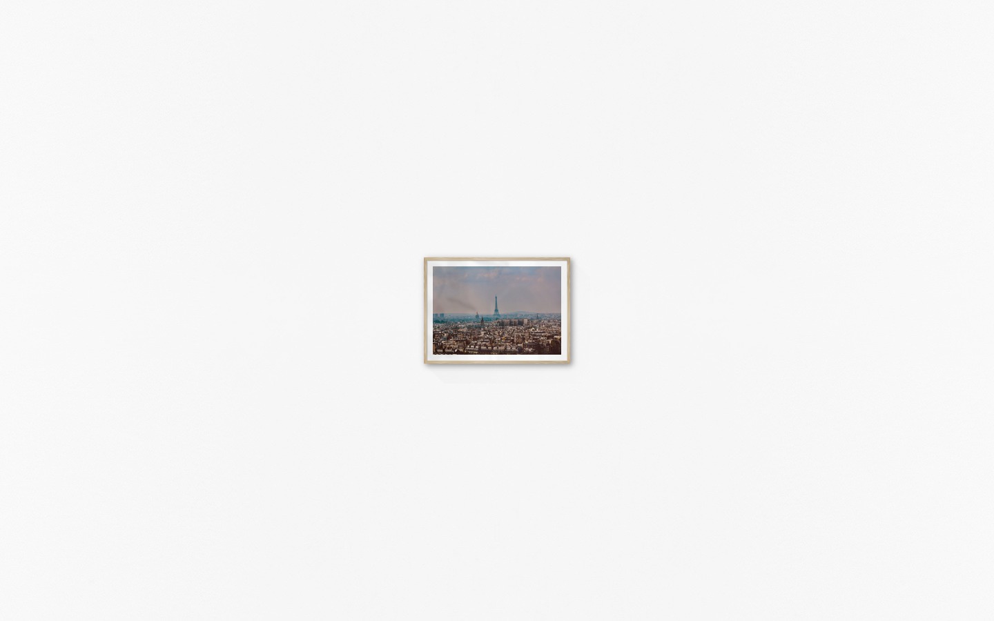 Gallery wall with picture frame in wood in size 50x70 with print "Eifel Tower in Paris"