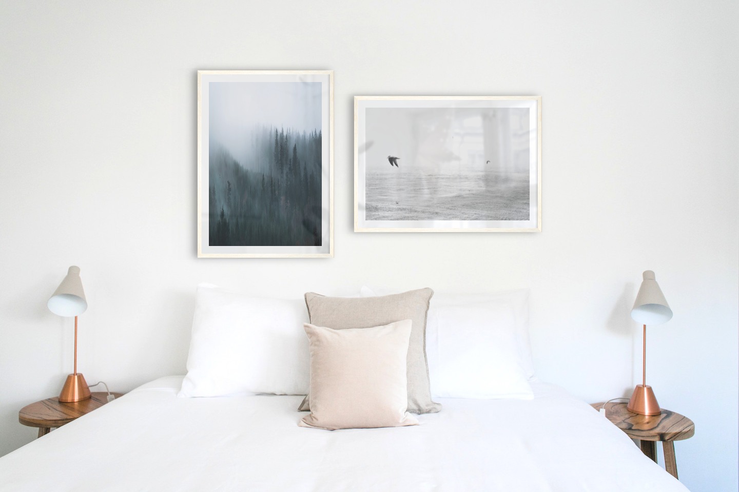 Gallery wall with picture frames in light wood in sizes 50x70 with prints "Foggy forest" and "Birds over the sea"