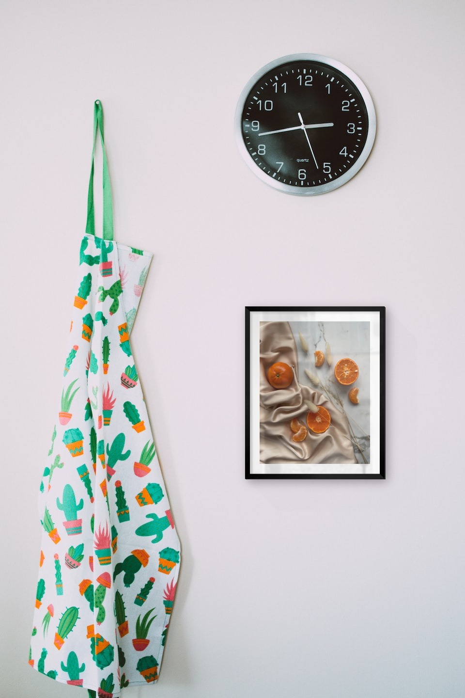 Gallery wall with picture frame in black in size 40x50 with print "Oranges"