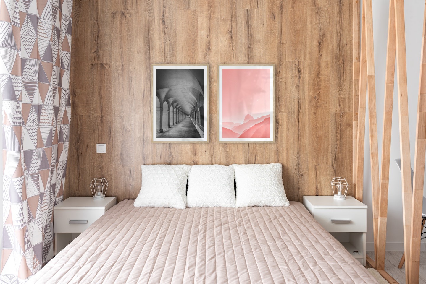 Gallery wall with picture frames in wood in sizes 50x70 with prints "Hallway with pillars and arches" and "Pink sky"