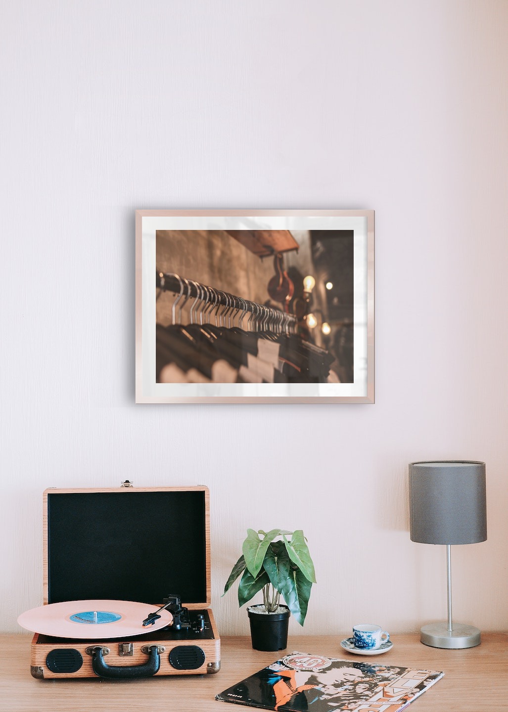 Gallery wall with picture frame in copper in size 40x50 with print "Clothes hangers"