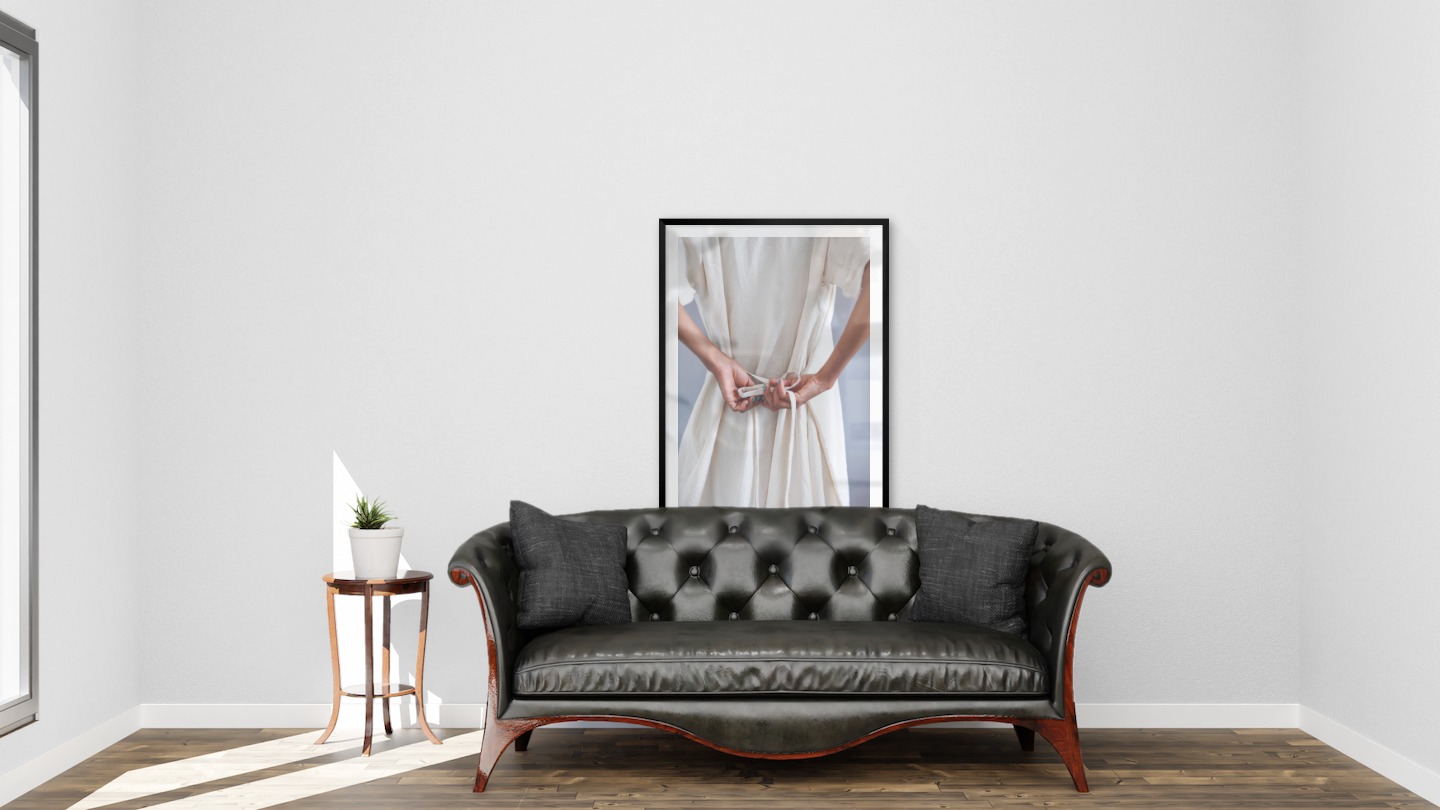 Gallery wall with picture frame in black in size 70x100 with print "Dress with waistband"