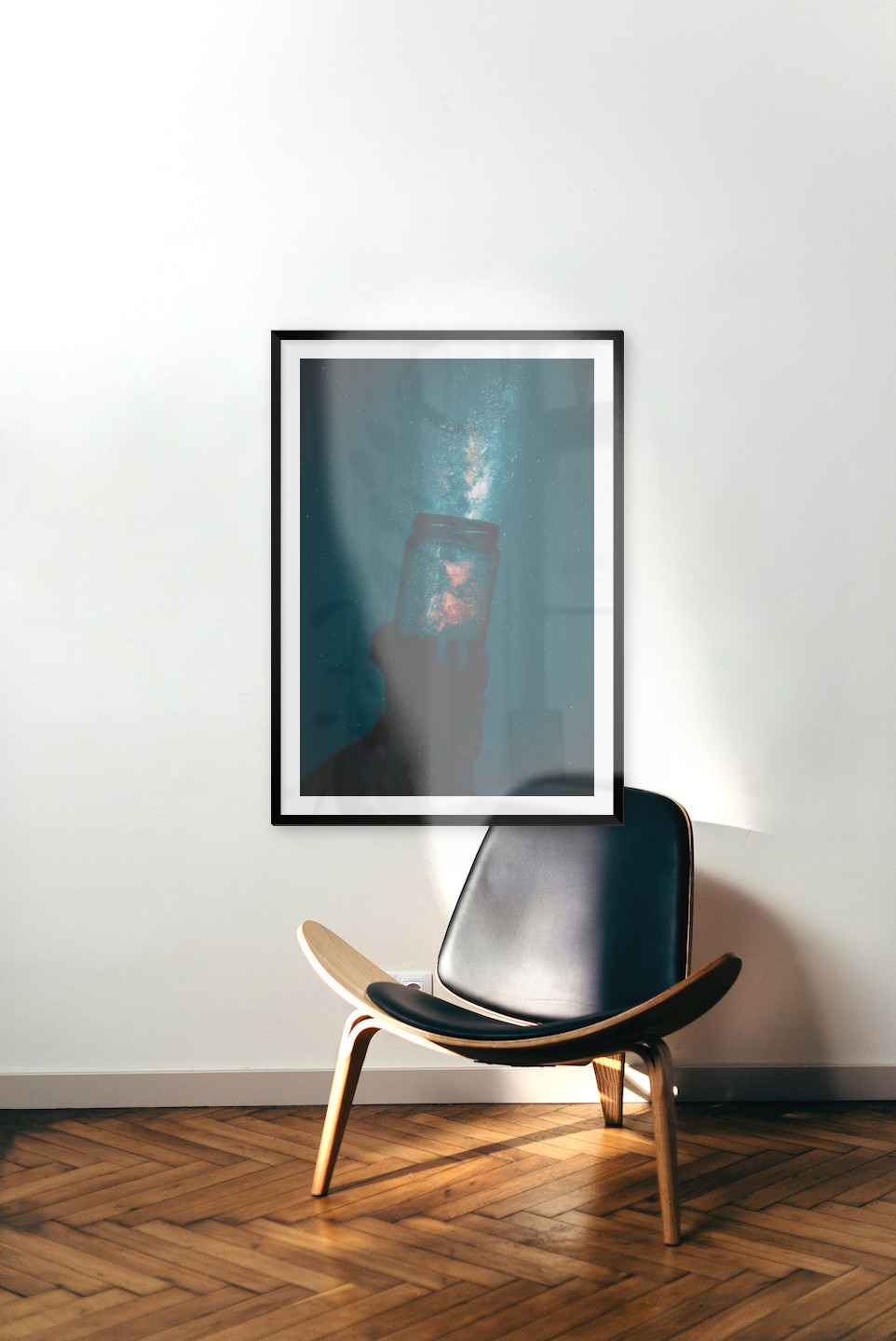 Gallery wall with picture frame in black in size 70x100 with print "Jar in front of space"