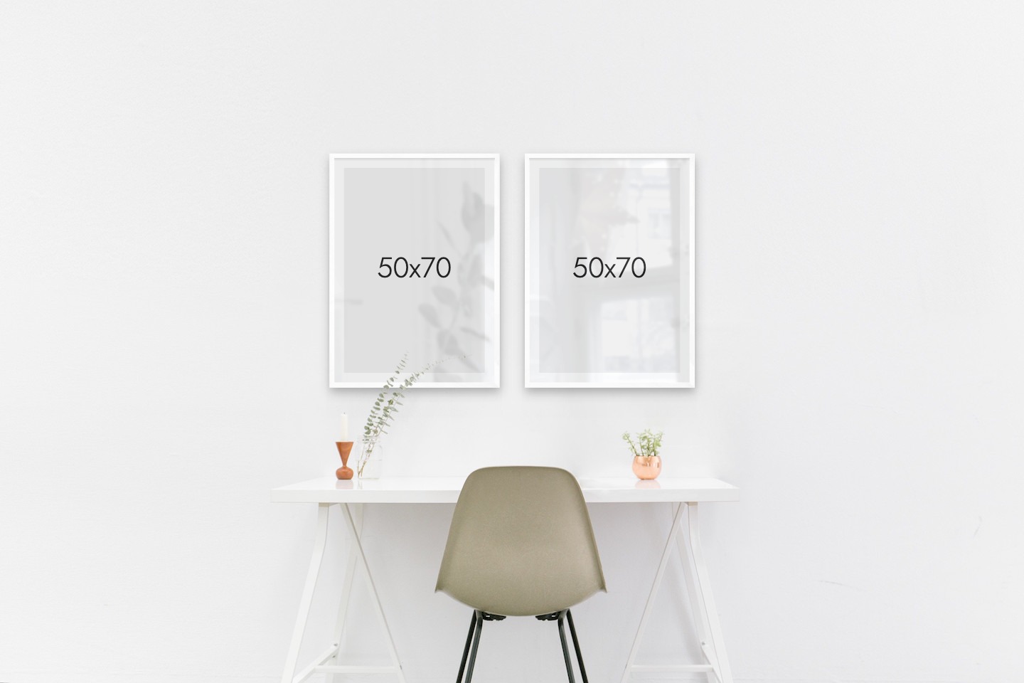 Gallery wall with picture frames in white in sizes 50x70
