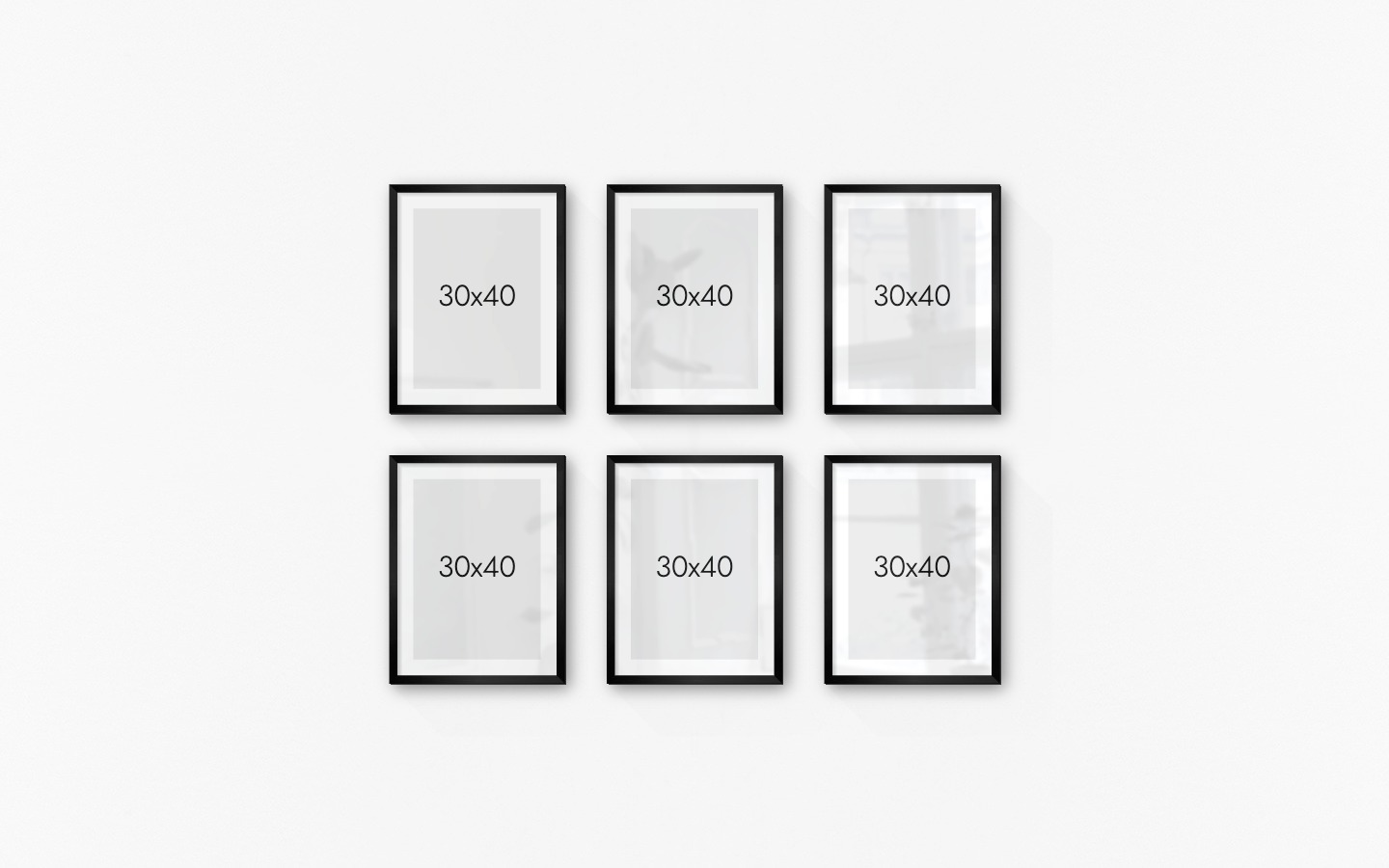 Gallery wall with picture frames in black in sizes 30x40