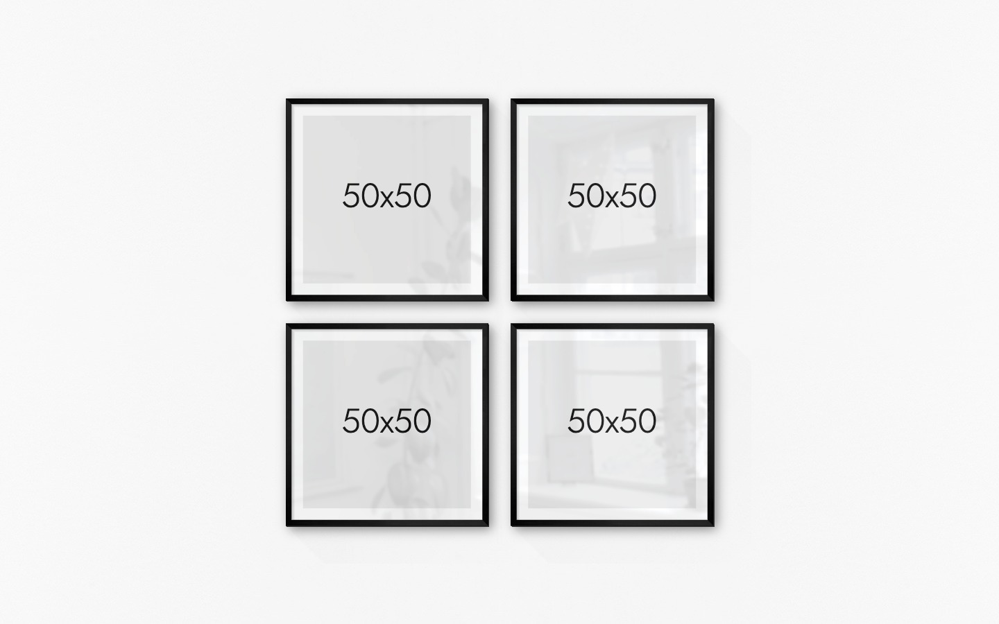 Gallery wall with picture frames in black in sizes 50x50