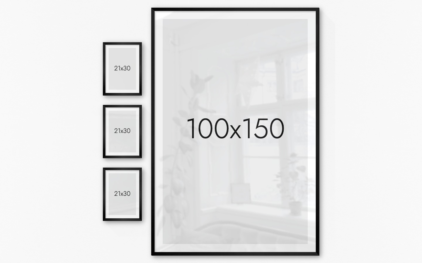 Gallery wall with picture frames in black in sizes 21x30 and 100x150