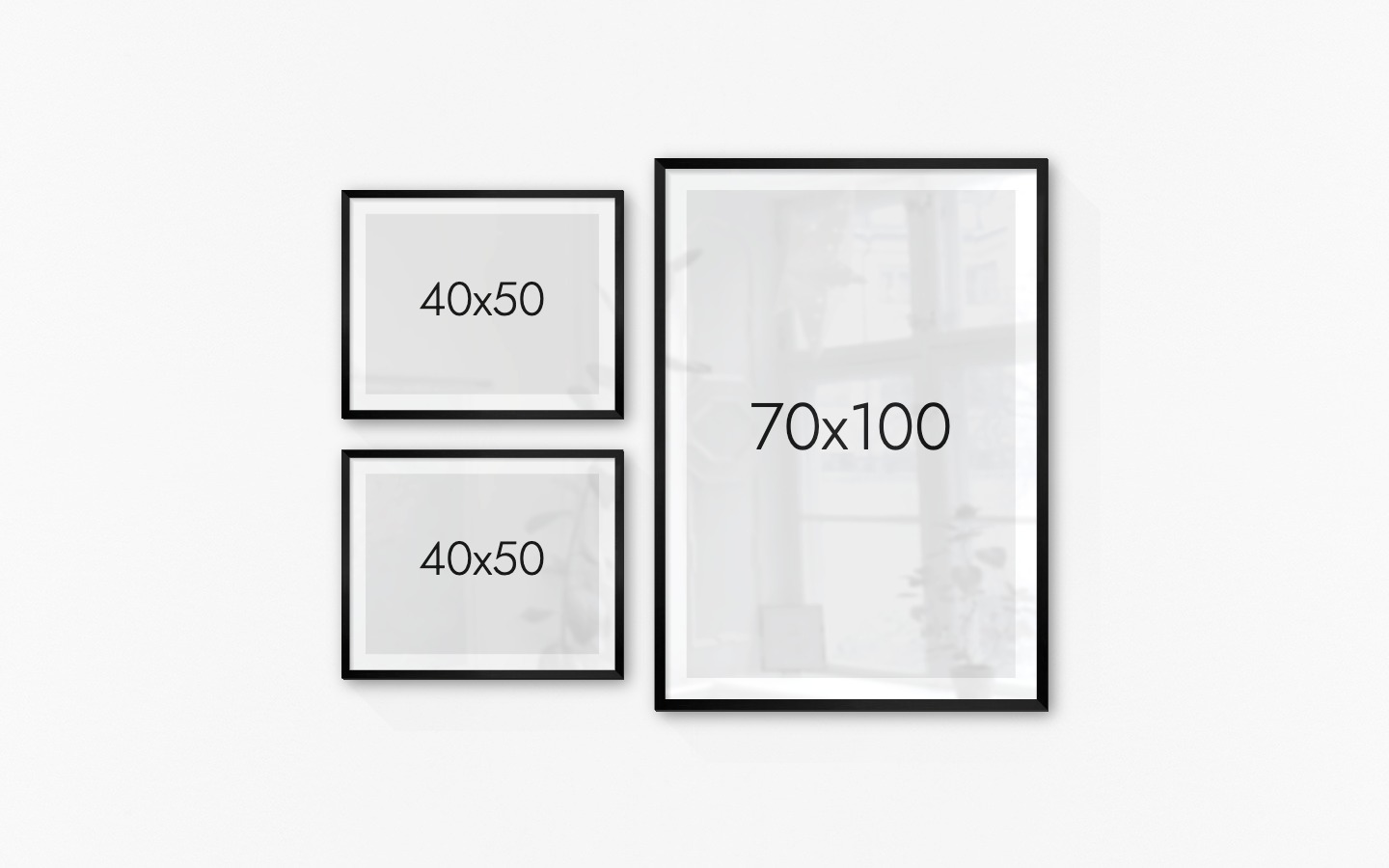 Gallery wall with picture frames in black in sizes 40x50 and 70x100