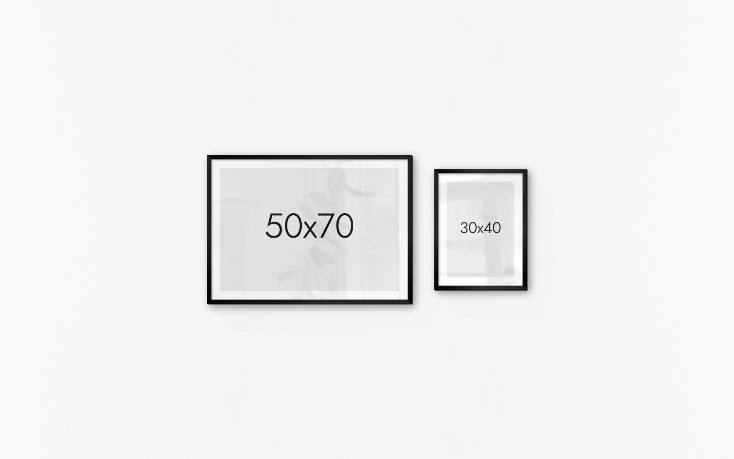 Gallery wall with picture frames in black in sizes 50x70 and 30x40