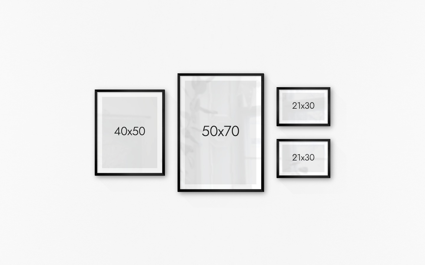 Gallery wall with picture frames in black in sizes 40x50, 50x70 and 21x30