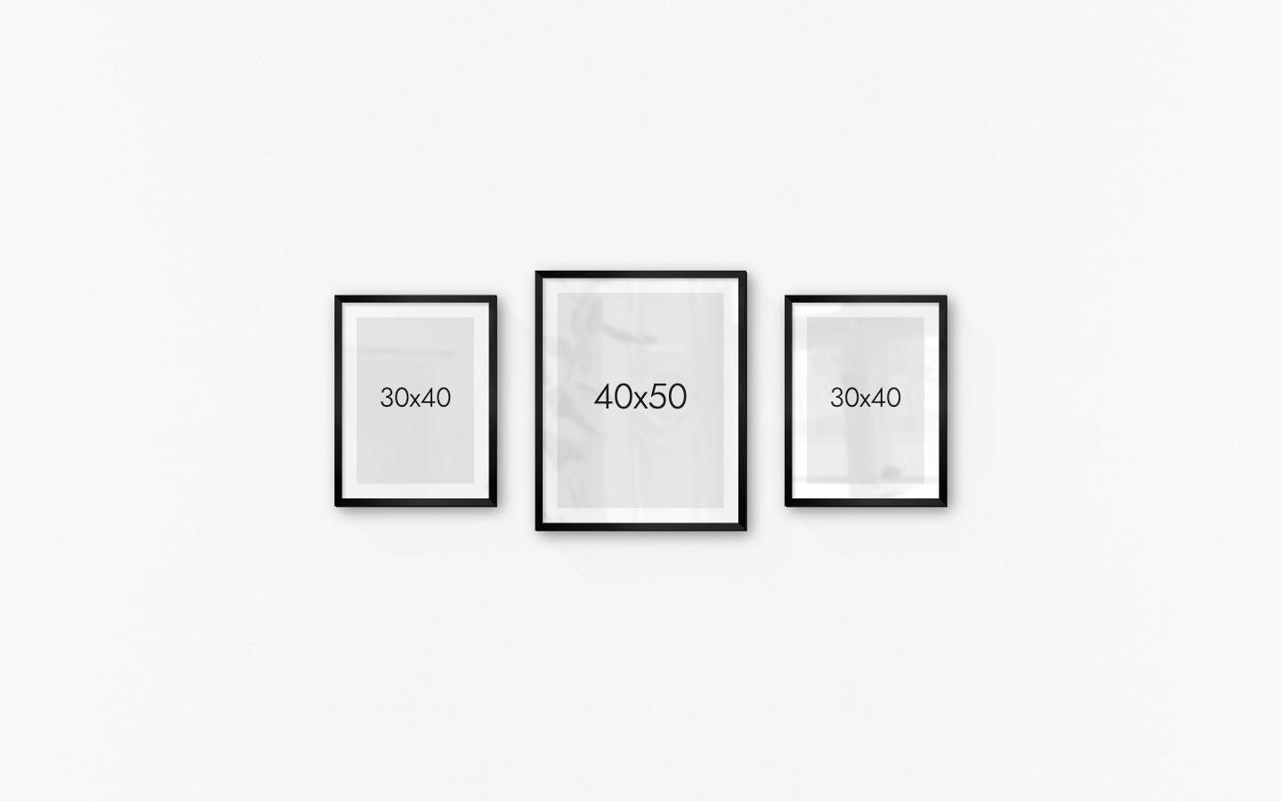 Gallery wall with picture frames in black in sizes 30x40 and 40x50