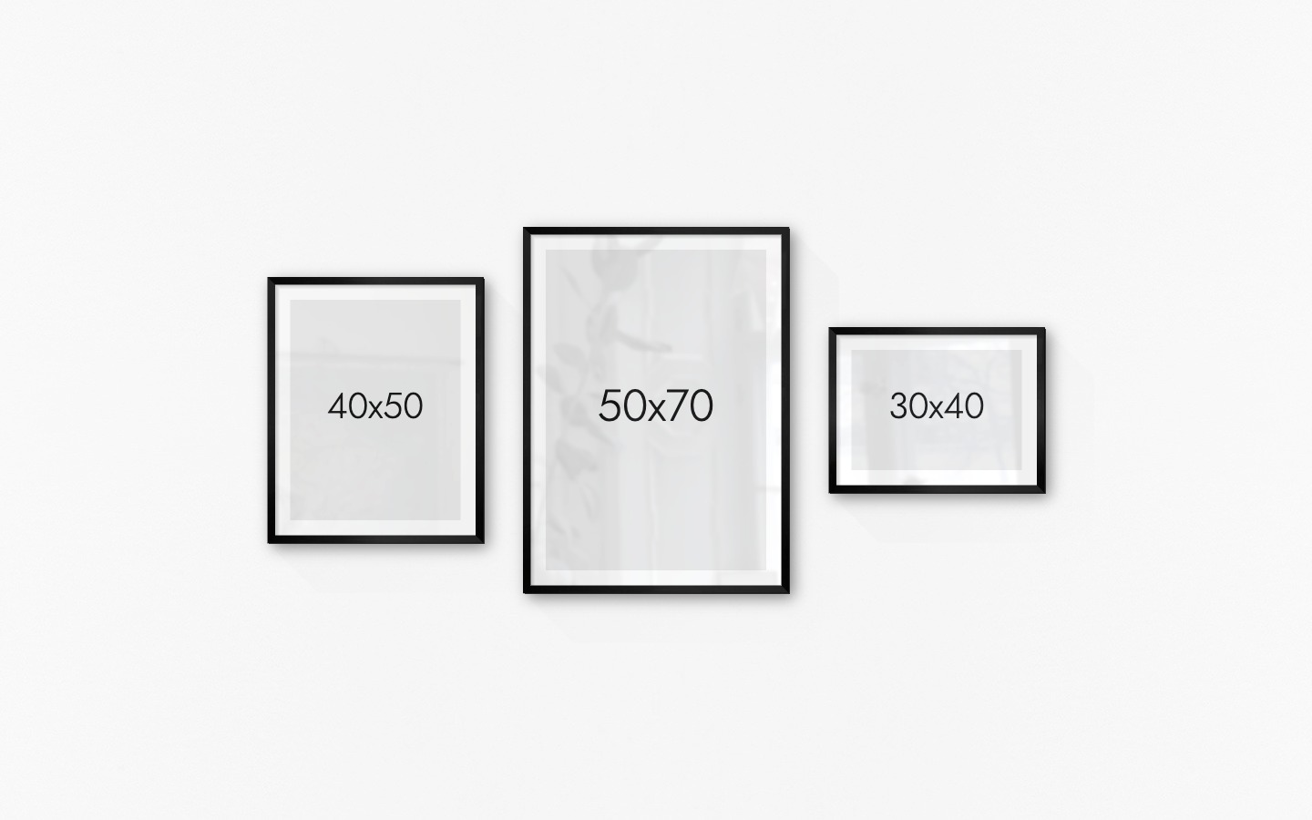 Gallery wall with picture frames in black in sizes 40x50, 50x70 and 30x40