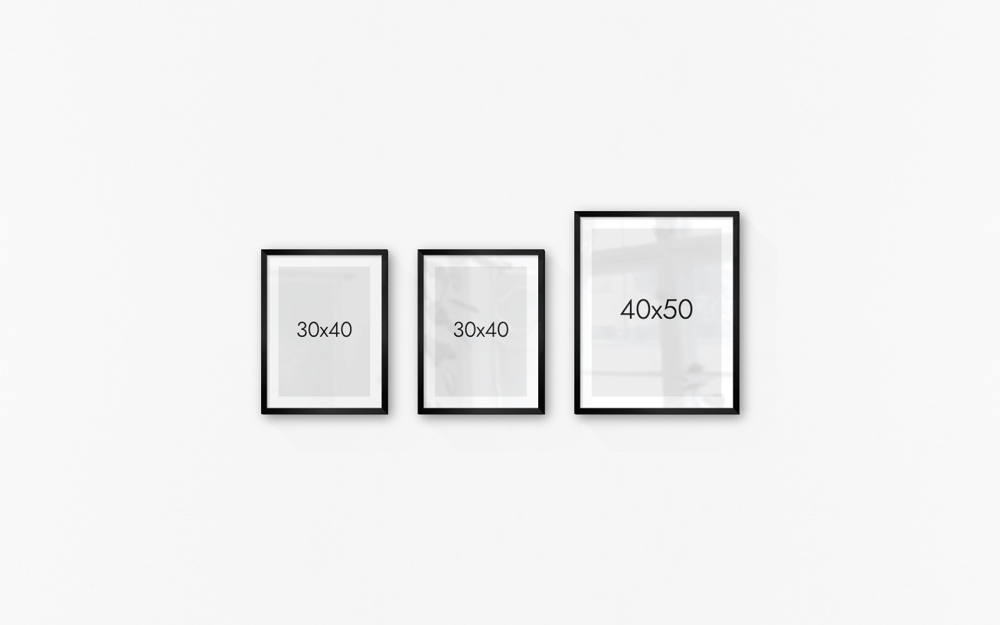 Gallery wall with picture frames in black in sizes 30x40 and 40x50