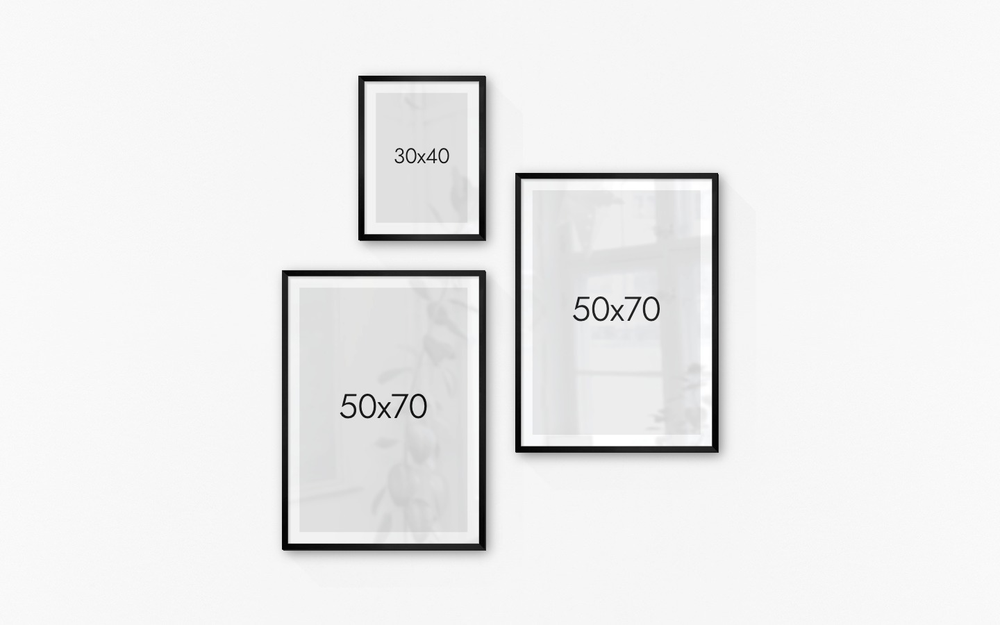 Gallery wall with picture frames in black in sizes 30x40 and 50x70