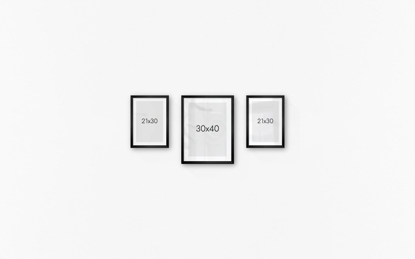 Gallery wall with picture frames in black in sizes 21x30 and 30x40