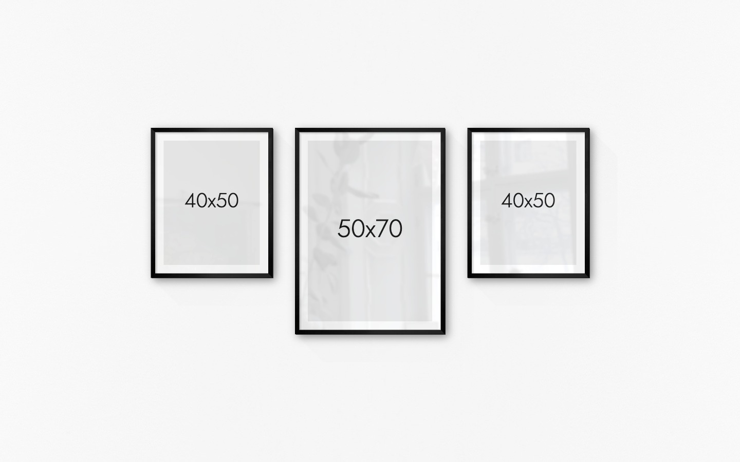 Gallery wall with picture frames in black in sizes 40x50 and 50x70