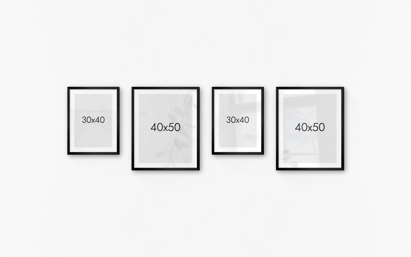Gallery wall with picture frames in black in sizes 30x40 and 40x50
