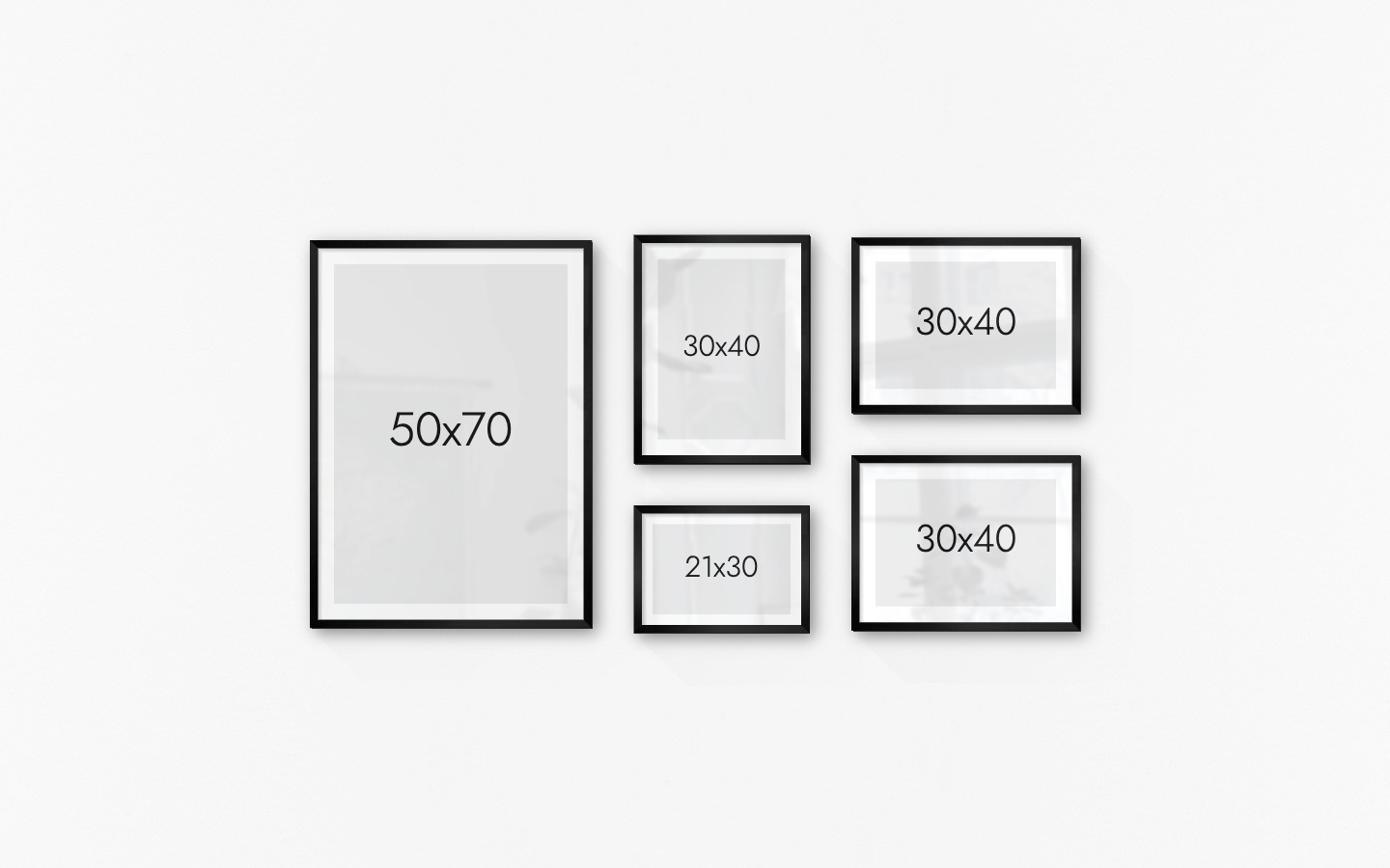 Gallery wall with picture frames in black in sizes 50x70, 30x40 and 21x30