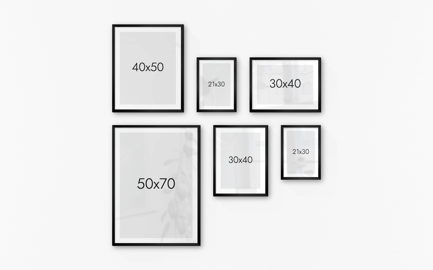 Gallery wall with picture frames in black in sizes 40x50, 21x30, 30x40 and 50x70