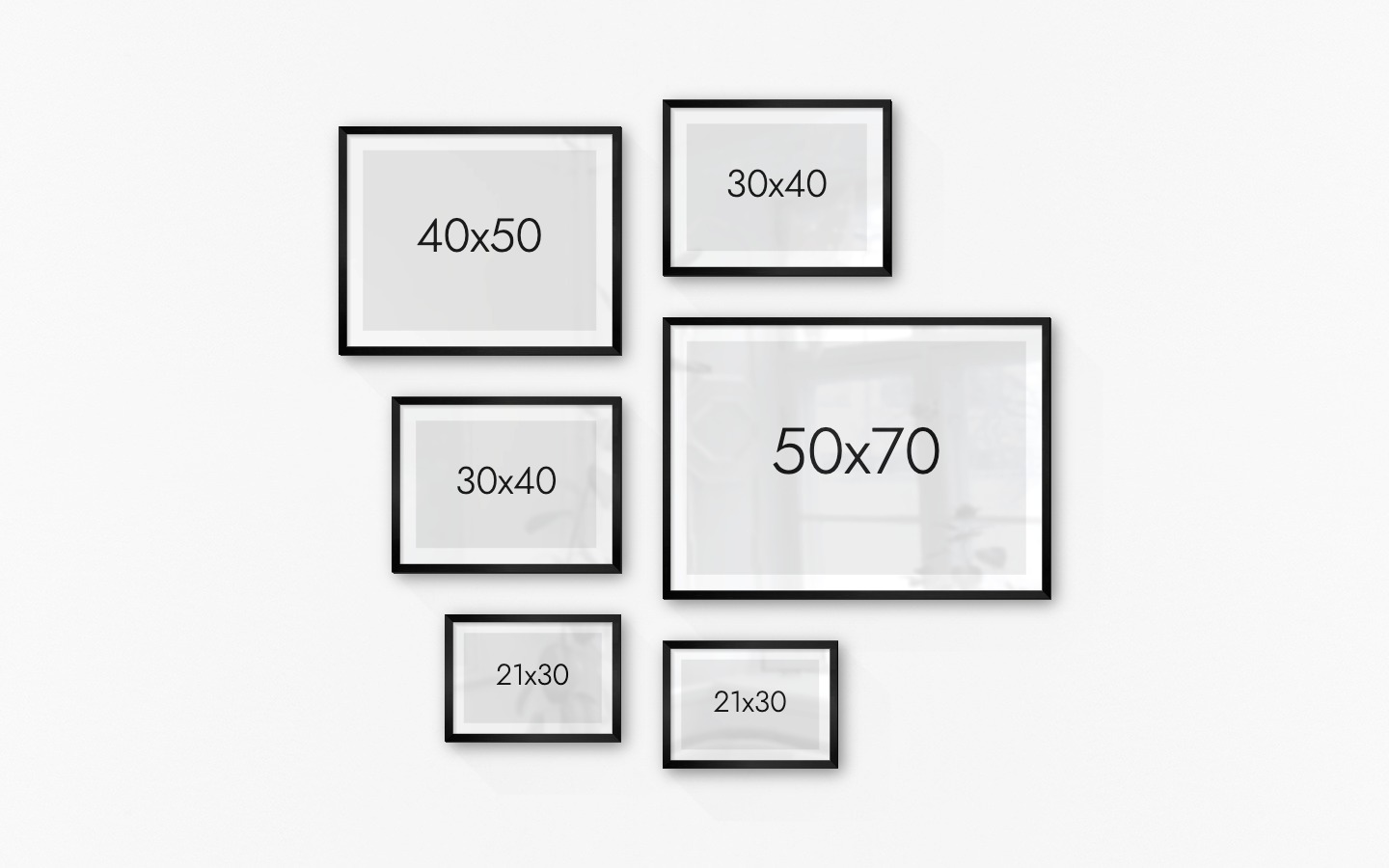 Gallery wall with picture frames in black in sizes 40x50, 30x40, 21x30 and 50x70