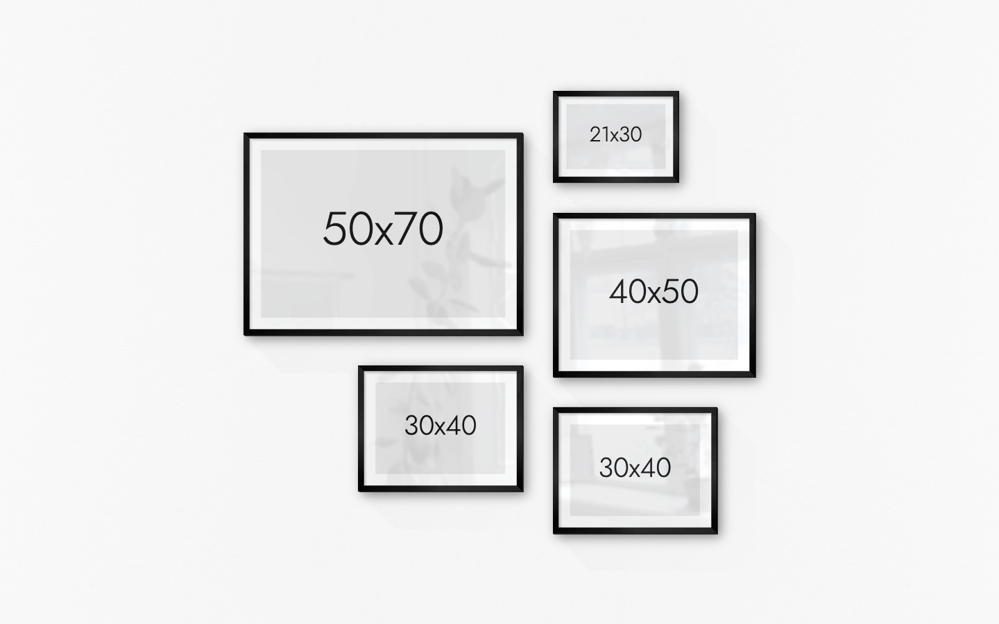 Gallery wall with picture frames in black in sizes 50x70, 30x40, 21x30 and 40x50